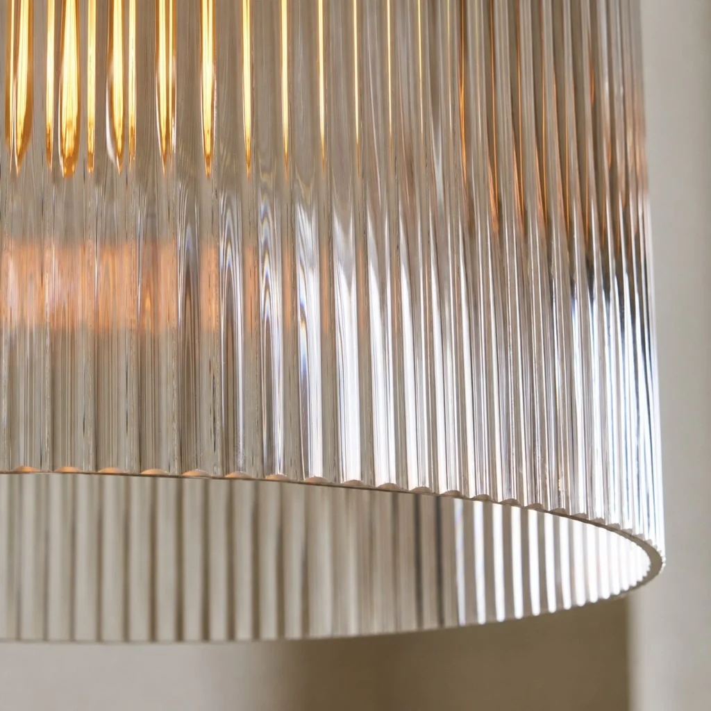 Vertical ribs in the glass, lit