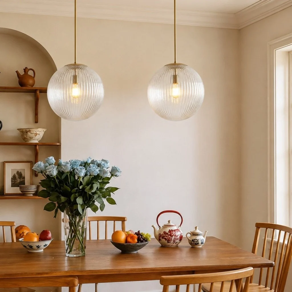 Bravira ribbed glass globes over a dining table