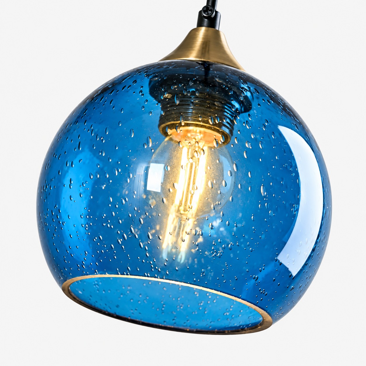 Bubble Glass Globe Pendant with a chrome mount and a bubble texture