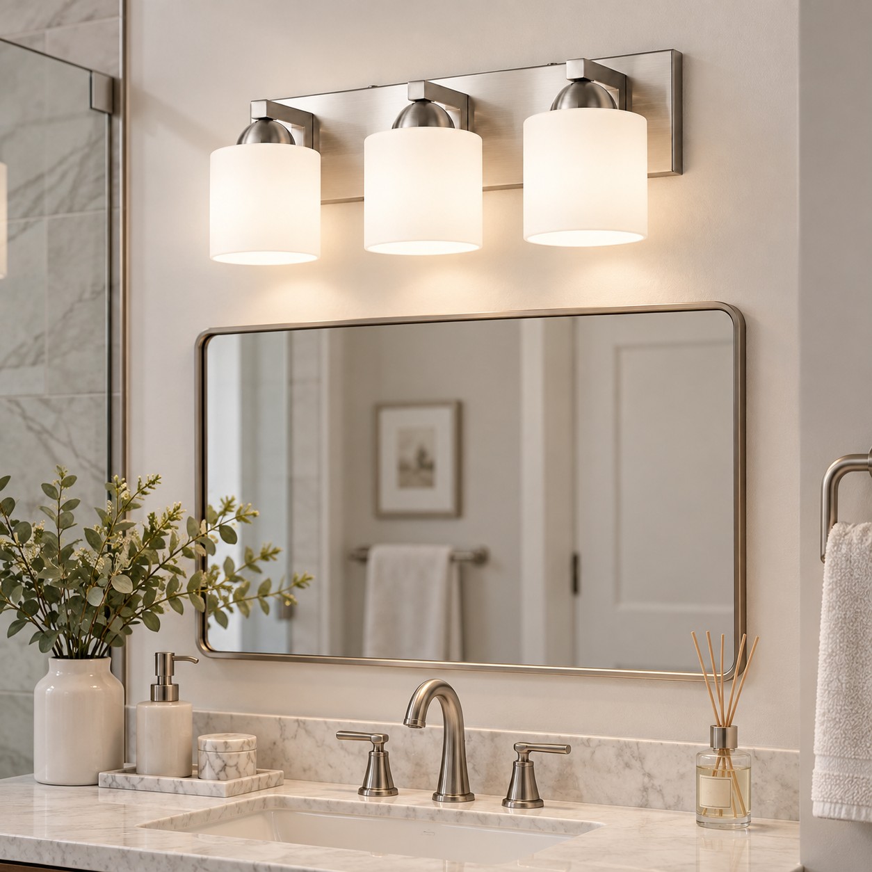 Glass Bathroom Vanity Light with one to six lights and a metal wall bar