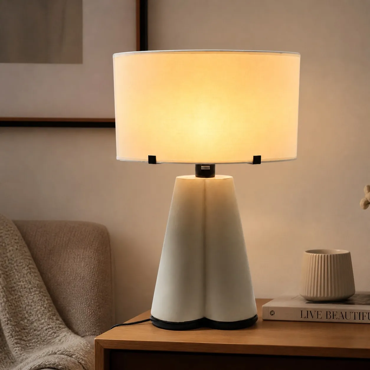 Beige leather table lamp glowing in a warm living room
