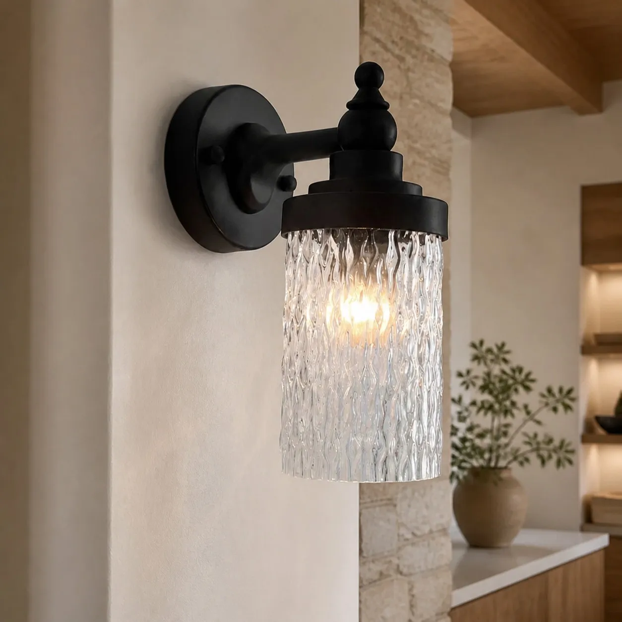 Averra ribbed glass outdoor wall sconce installed beside a covered porch wall
