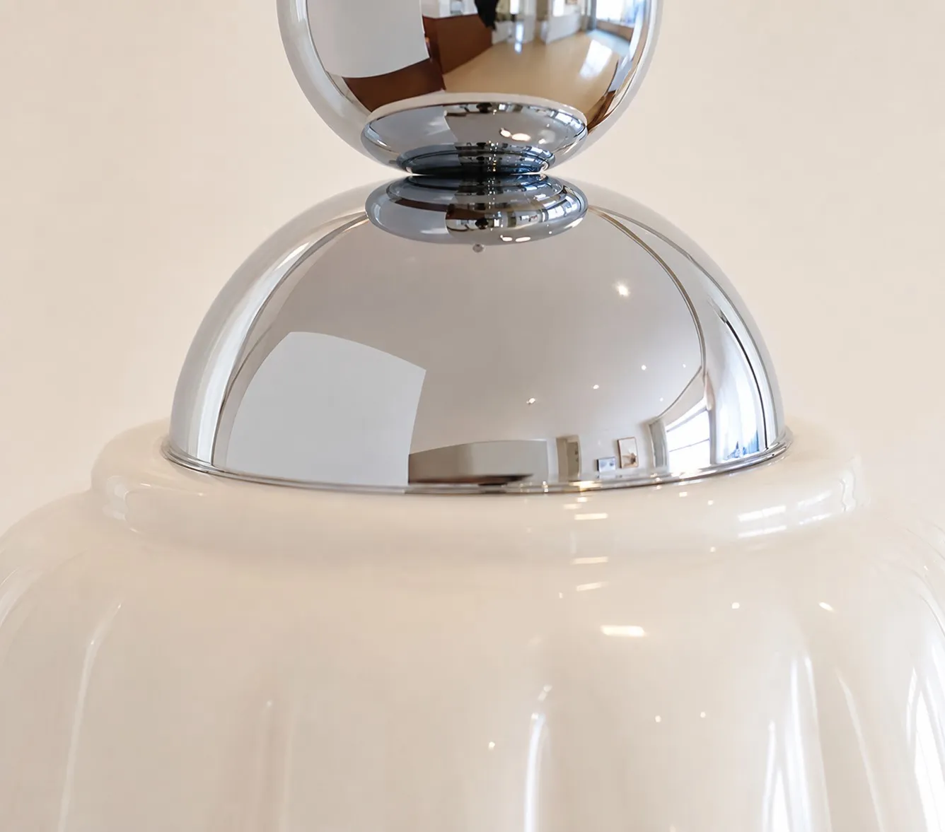 Close view of polished metal pendant hardware