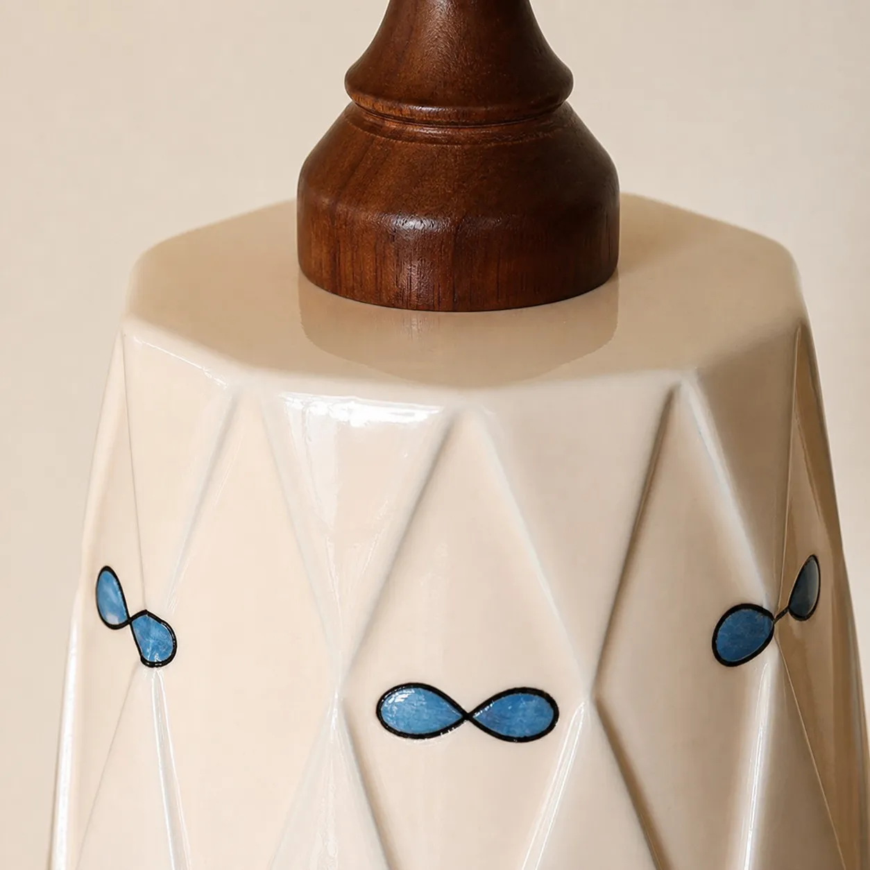close view of diamond ceramic shade and blue petal detail