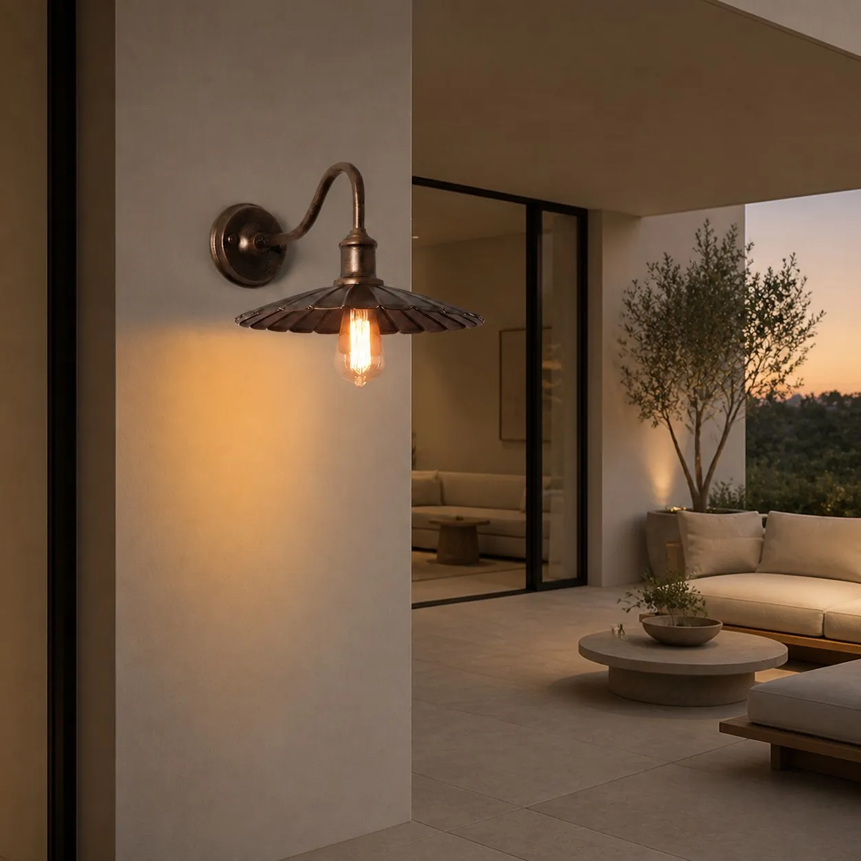 Outdoor wall sconce at a covered exterior entry