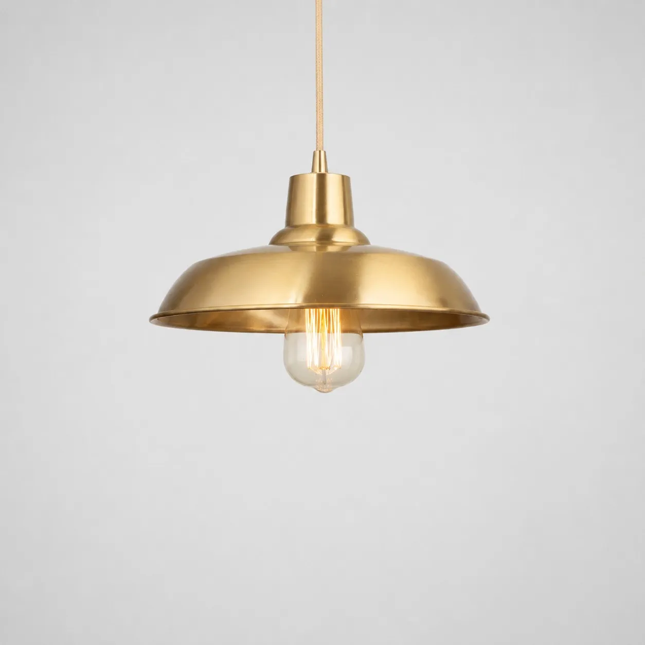 Brushed brass disc pendant light product view