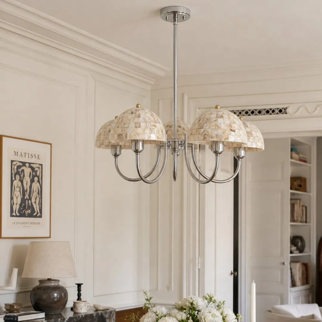 Beige shell five-light chandelier installed in an elegant dining room