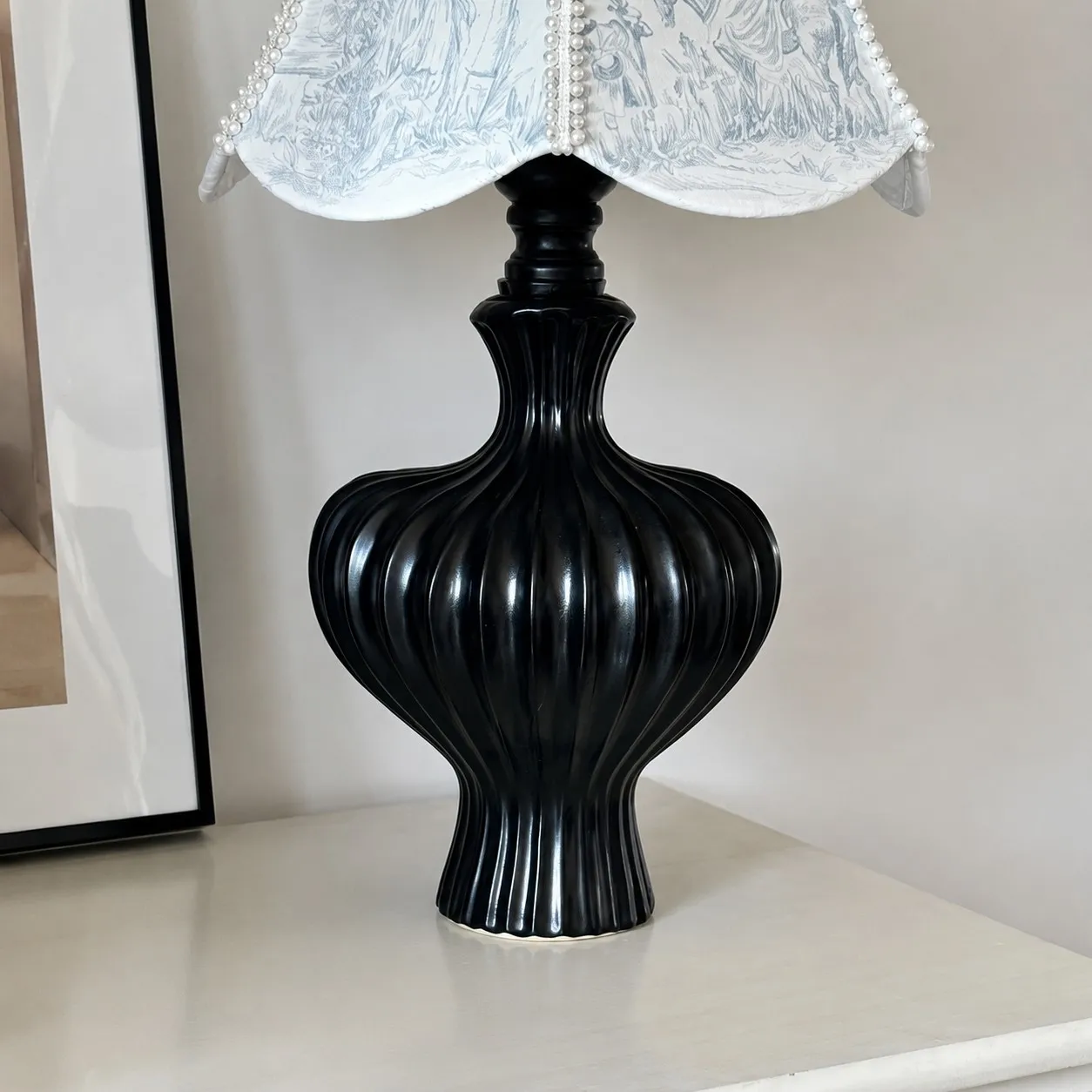 Black sculptural table lamp base detail