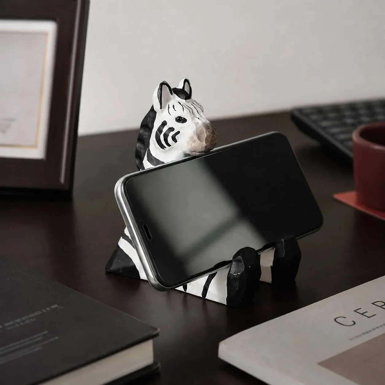 Wooden animal phone stand scene view
