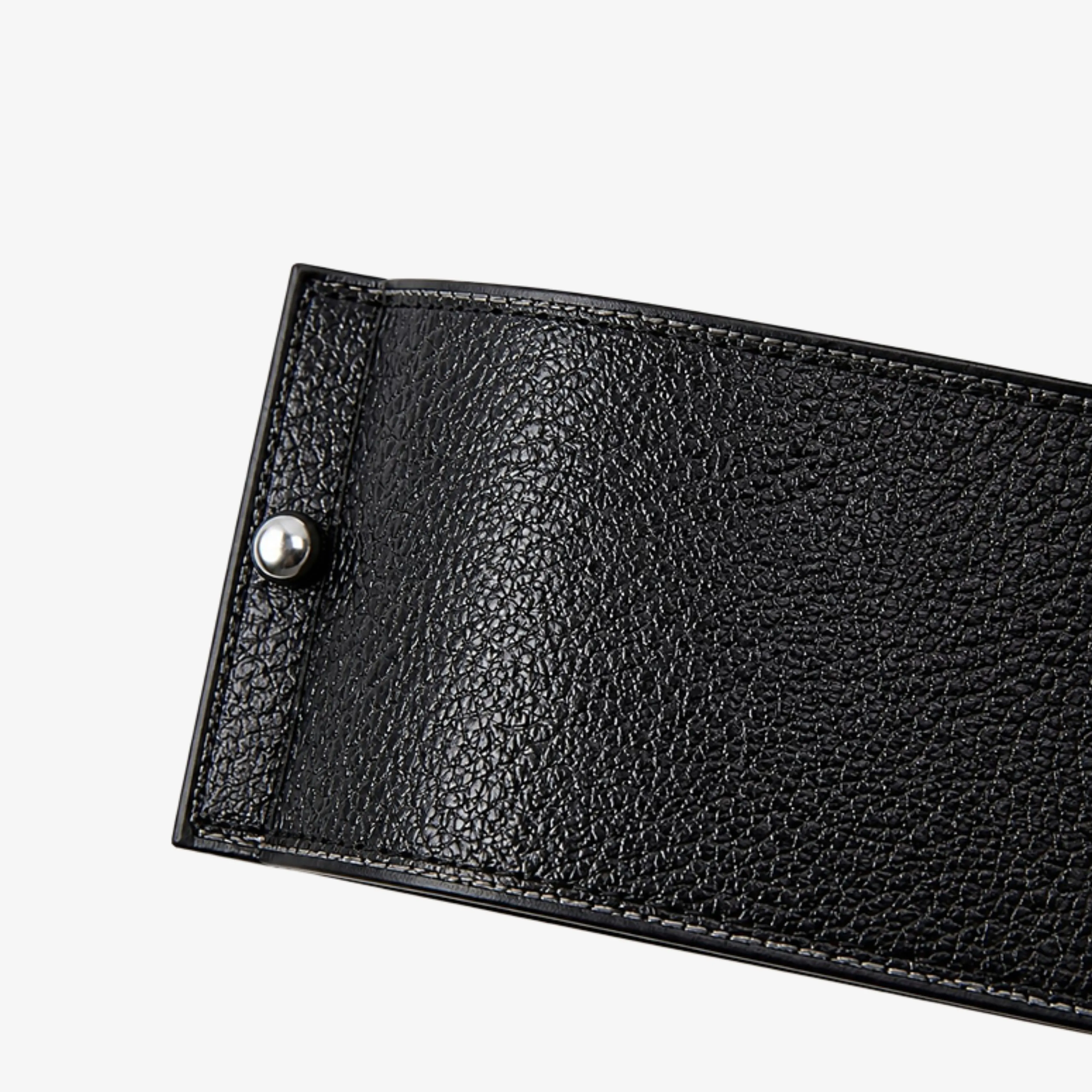 Black textured leather and polished metal fastener