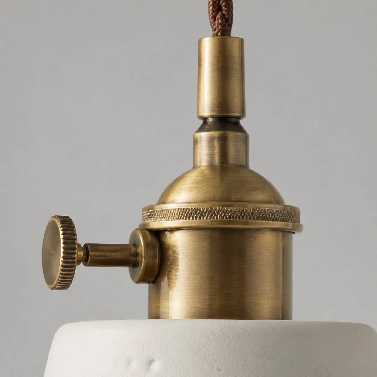 Antique brass-tone socket and cord detail