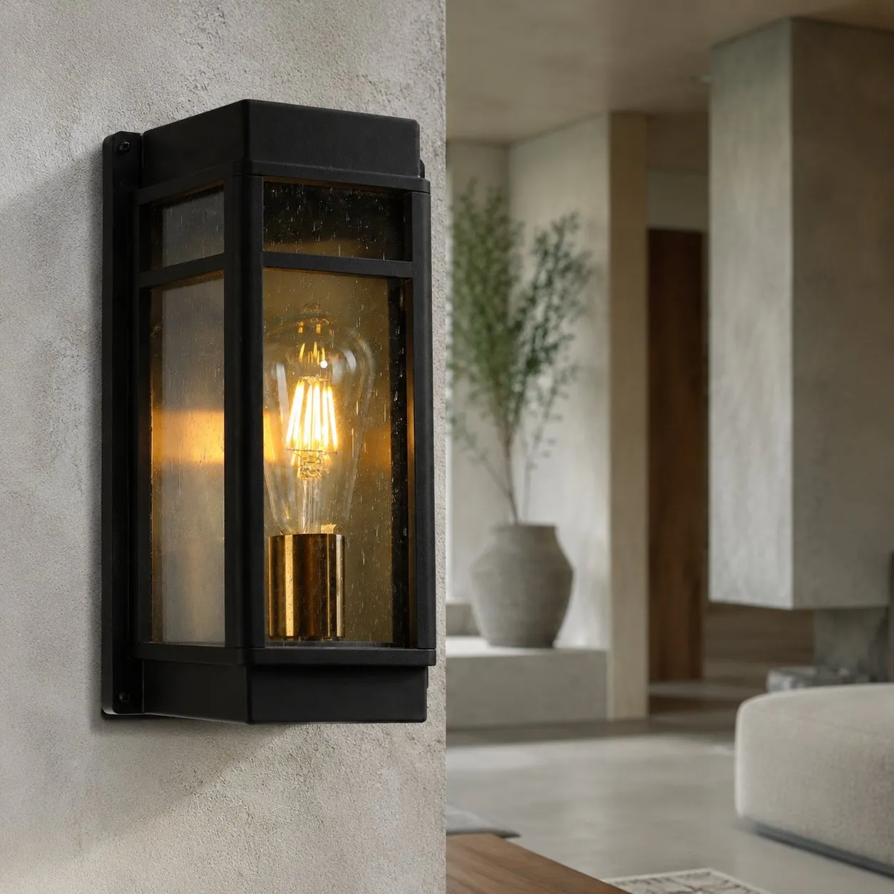 Clear glass shade and outdoor wall sconce detail