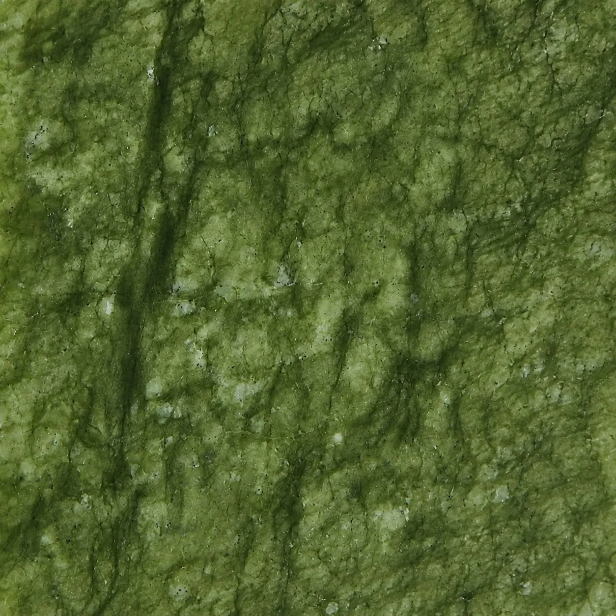 Close-up of natural green jade stone texture