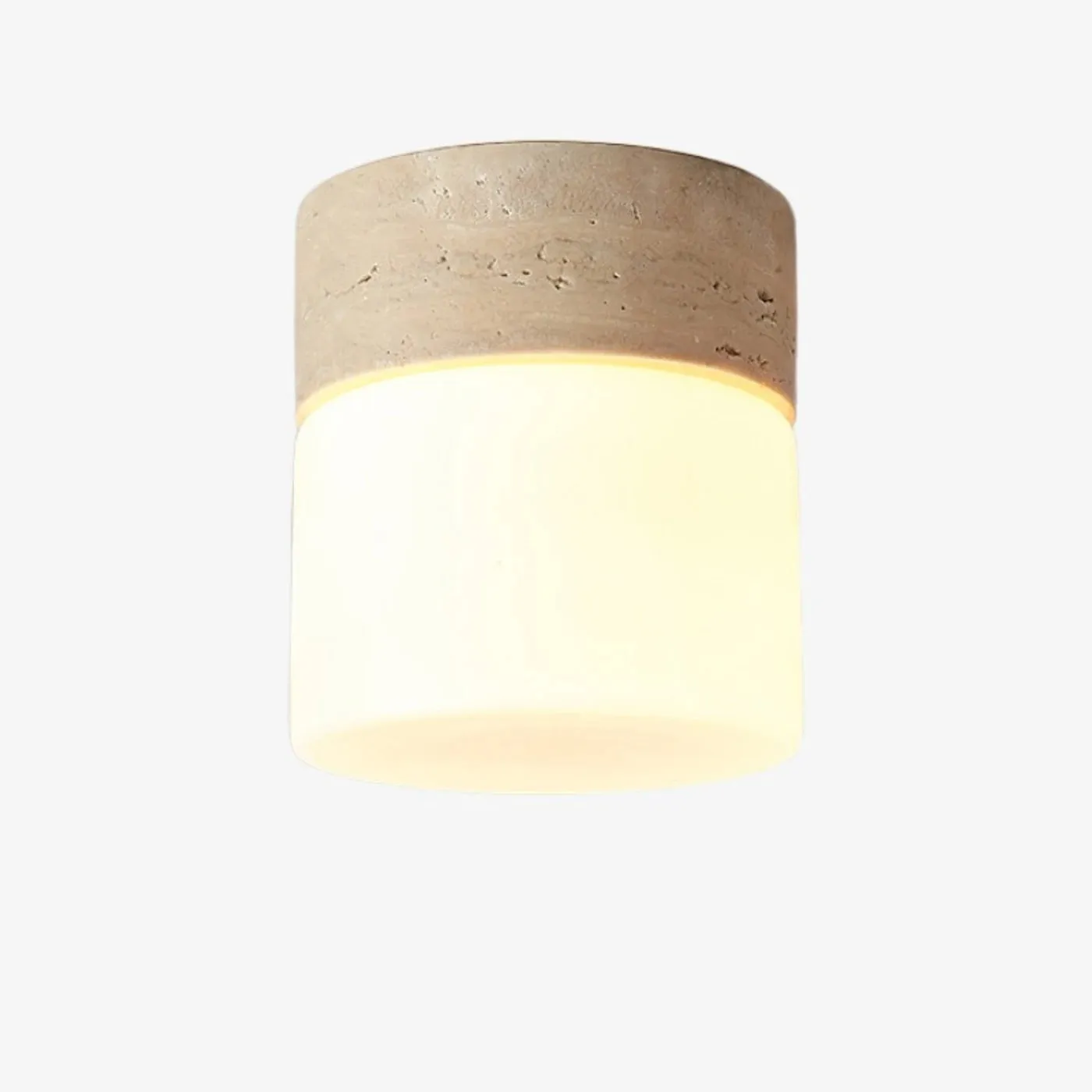 Ivory travertine flush mount ceiling light with warm glass shade