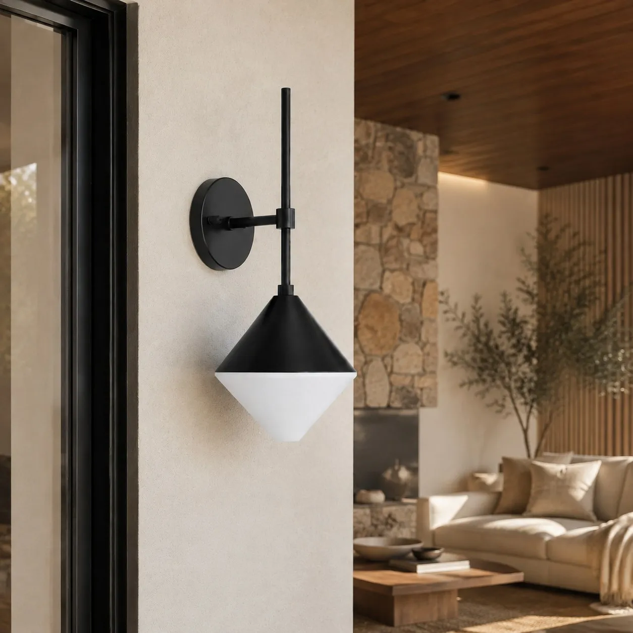 black and white waterproof wall sconce beside an outdoor patio railing