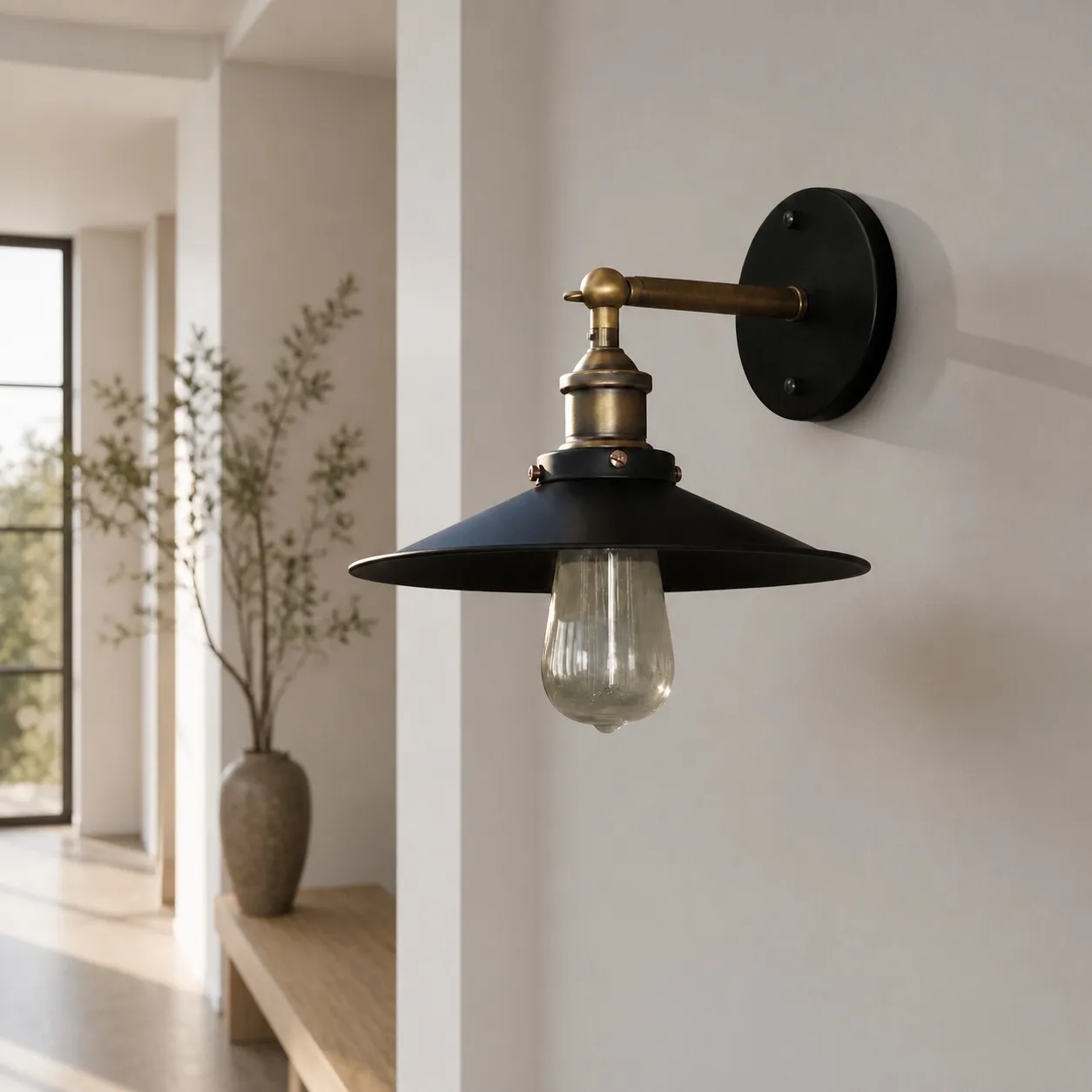 Outdoor wall lamp installed on exterior wall in daylight