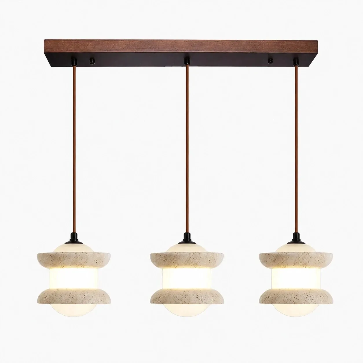 Three-light travertine stone pendant light on a plain background