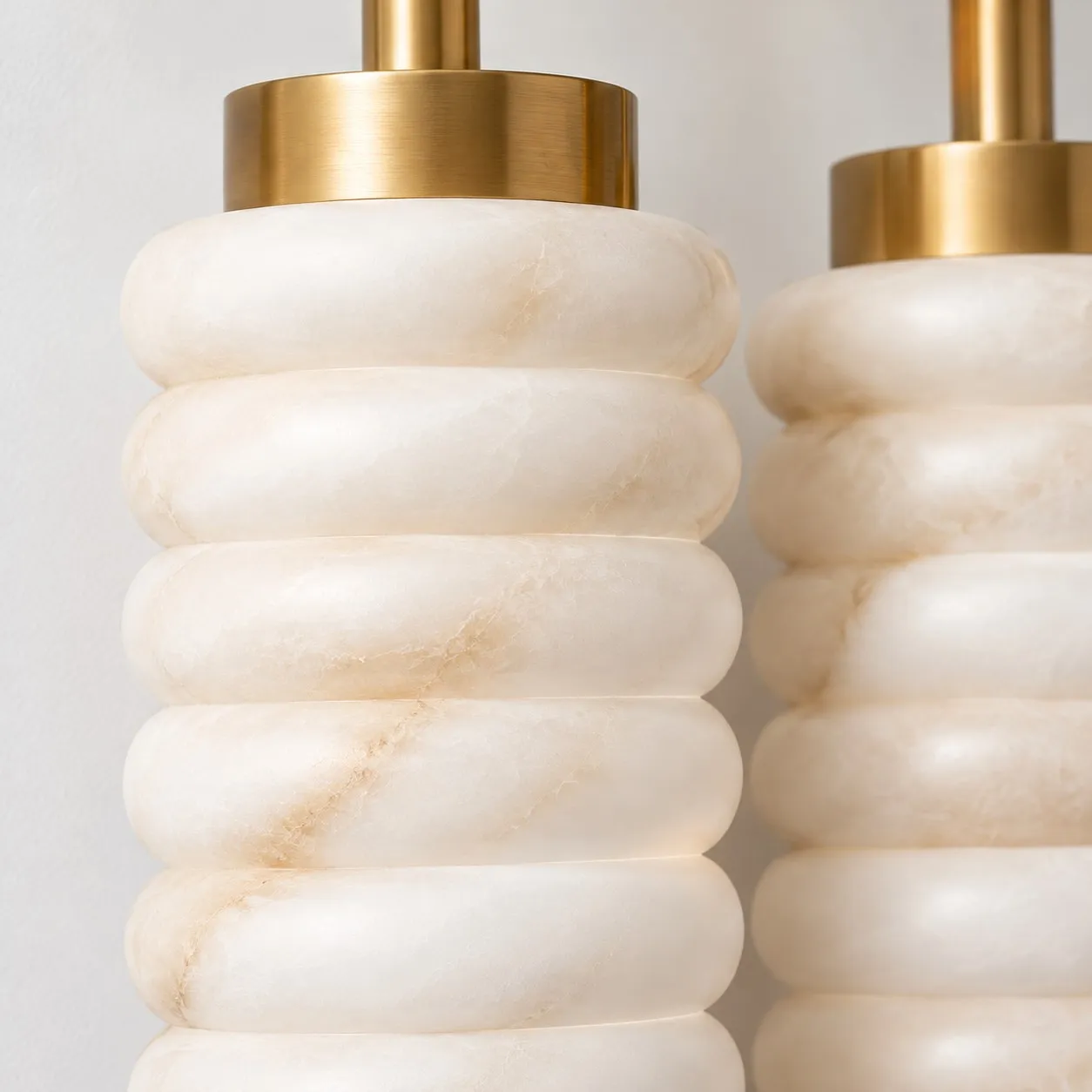 Brass collar and ribbed alabaster shade detail