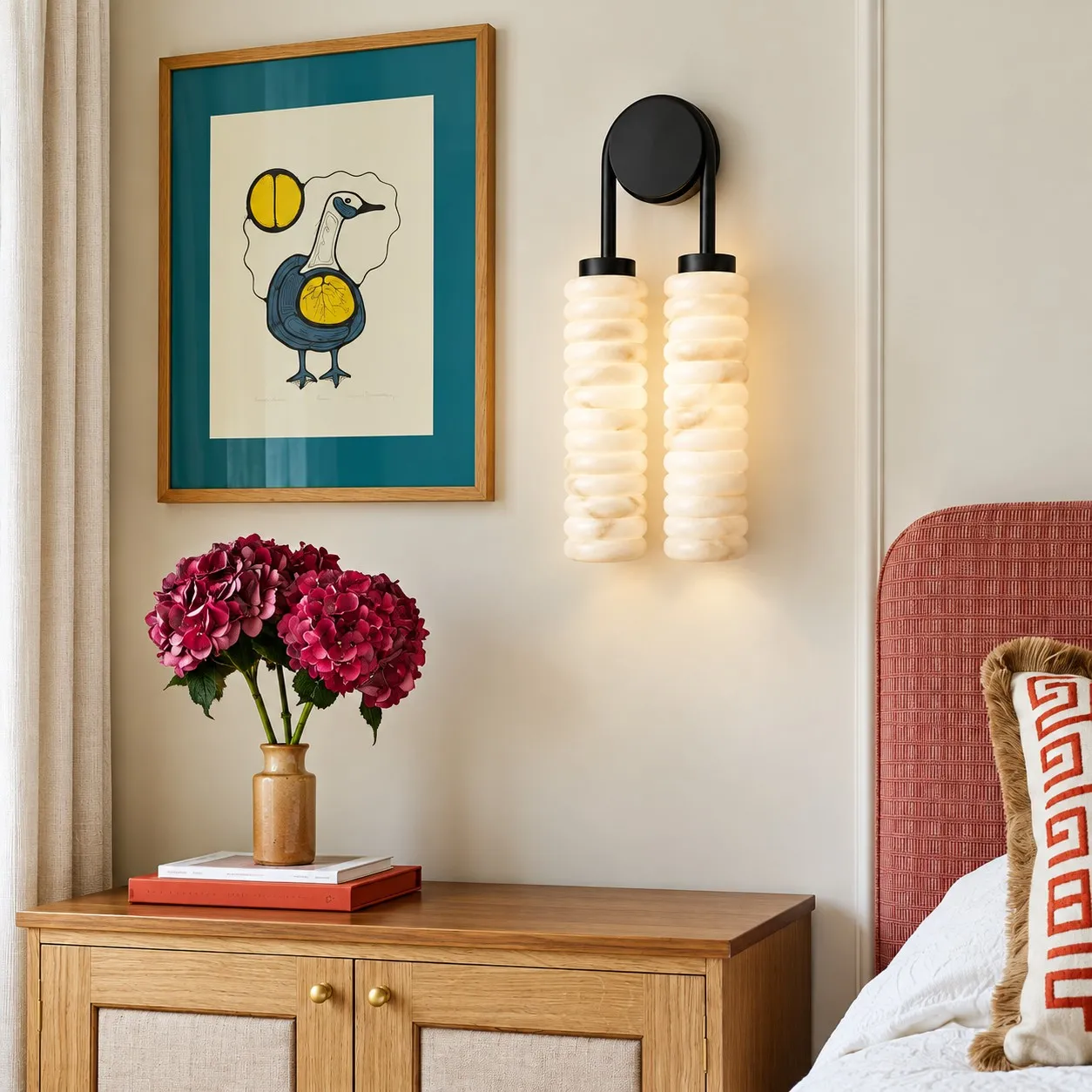 Aurora black ribbed alabaster wall light beside a bed