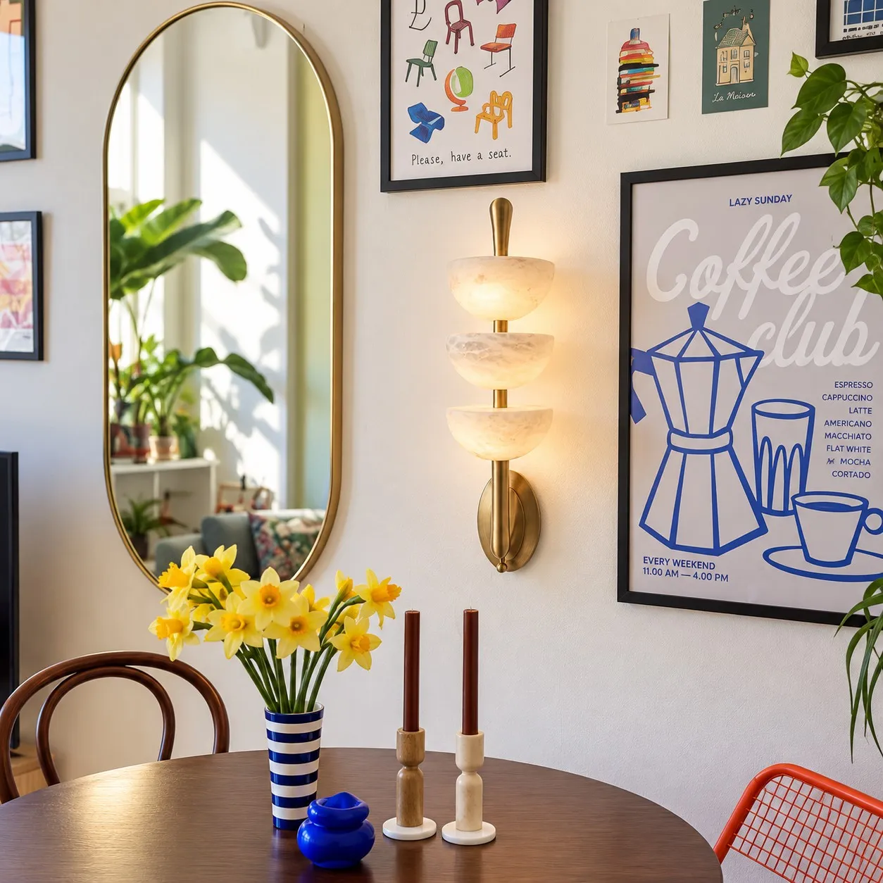 Velora alabaster wall sconce in a dining area