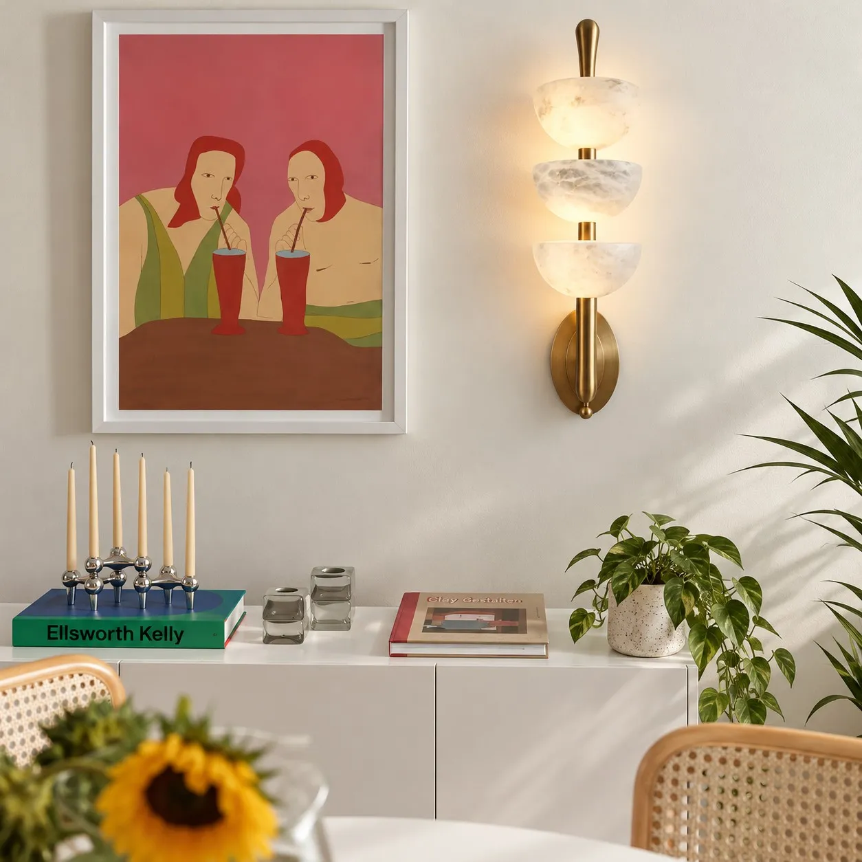 Velora alabaster wall sconce in a dining room