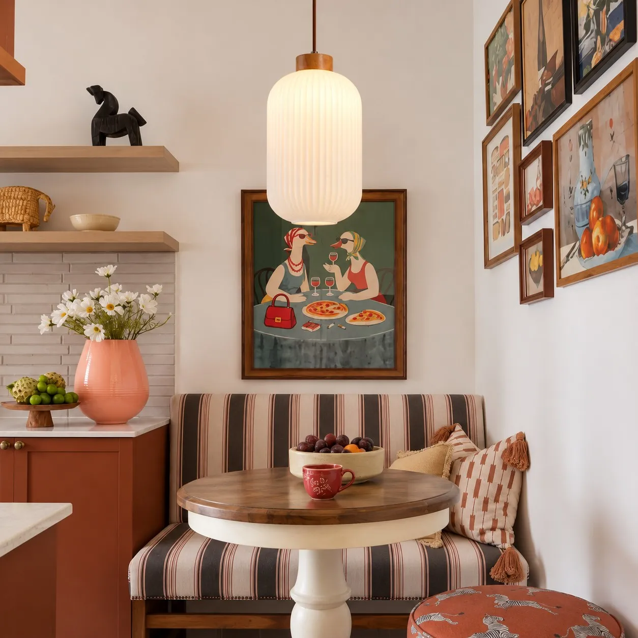 Ribella lantern pendant above a dining table