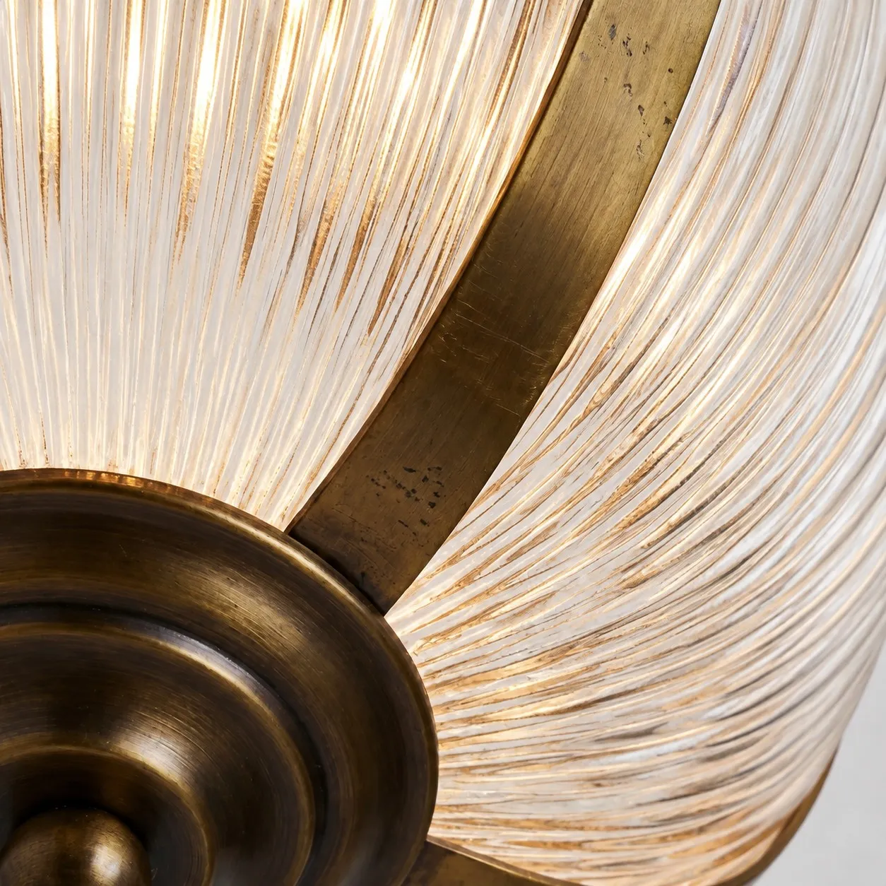 Ribbed glass and brass finial detail