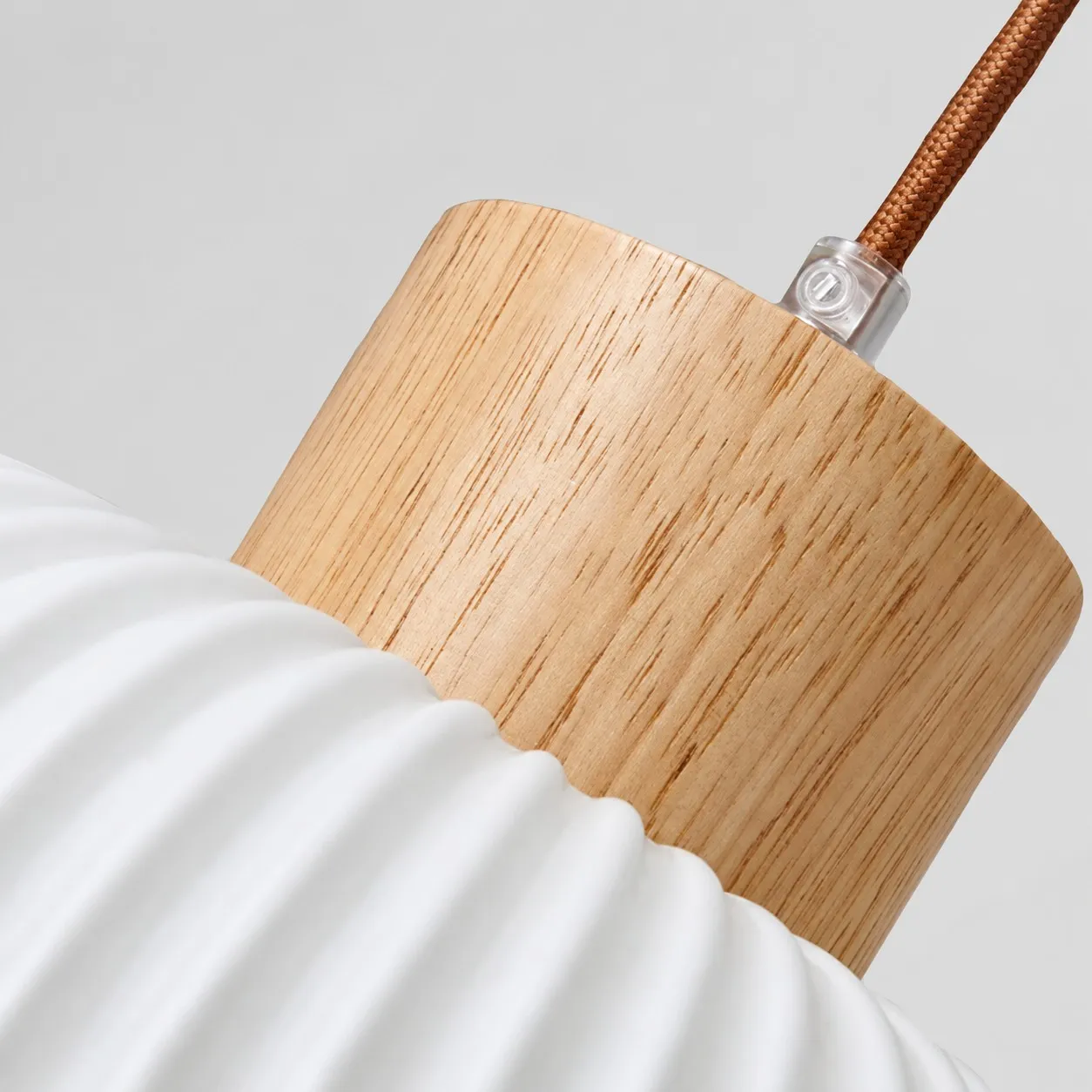 Natural wood cap and cord detail