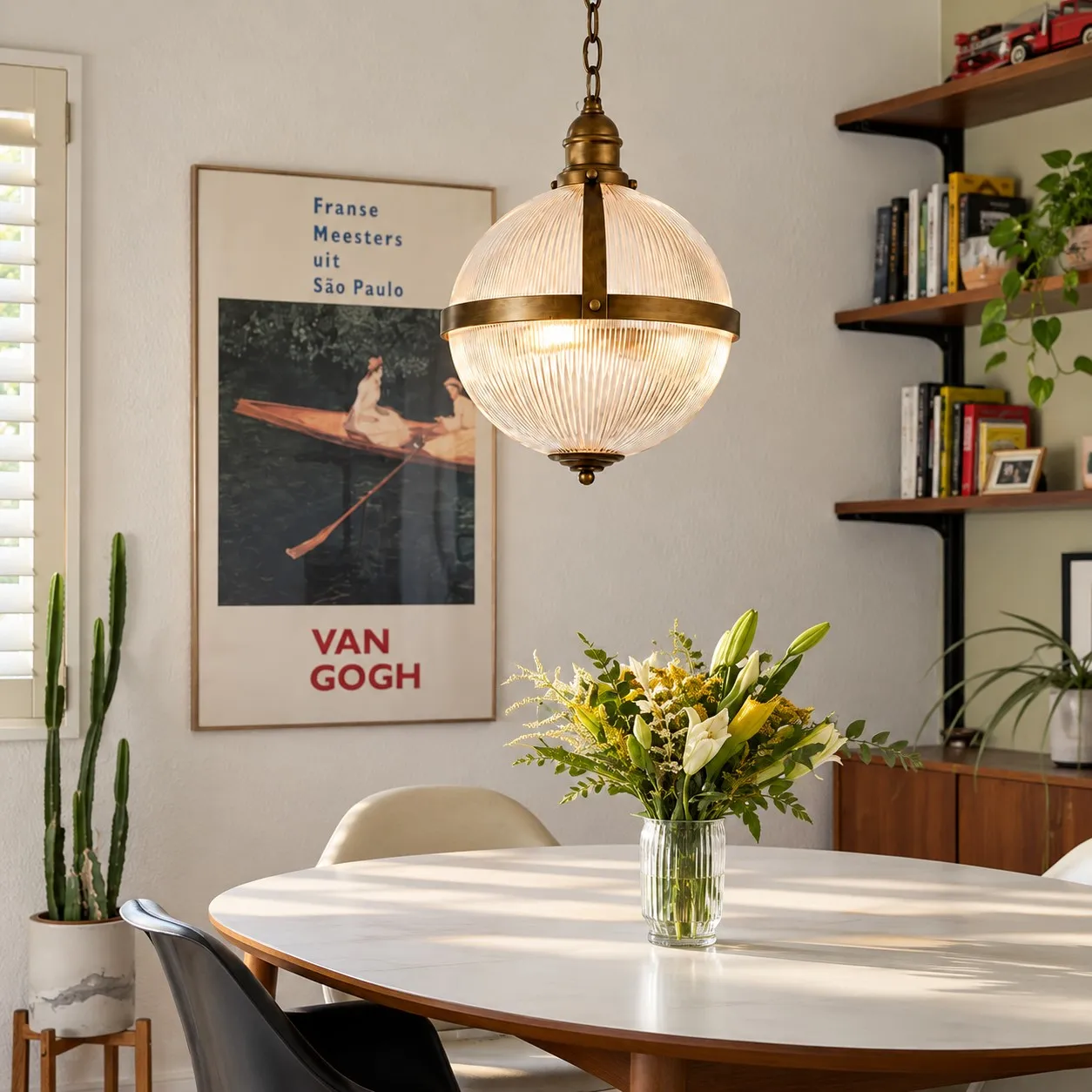 Ribella glass globe pendant in a dining room