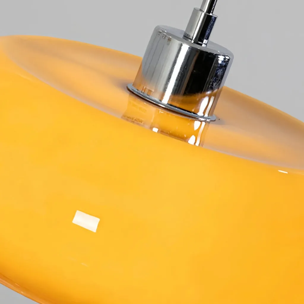 Orange glass shade and metal canopy detail